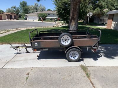 Snowbear Utility Trailer with spare tire. Great for hauling.