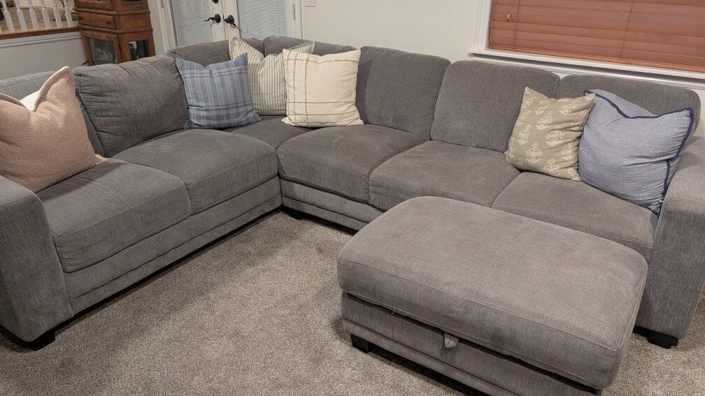 grey sectional with storage ottoman