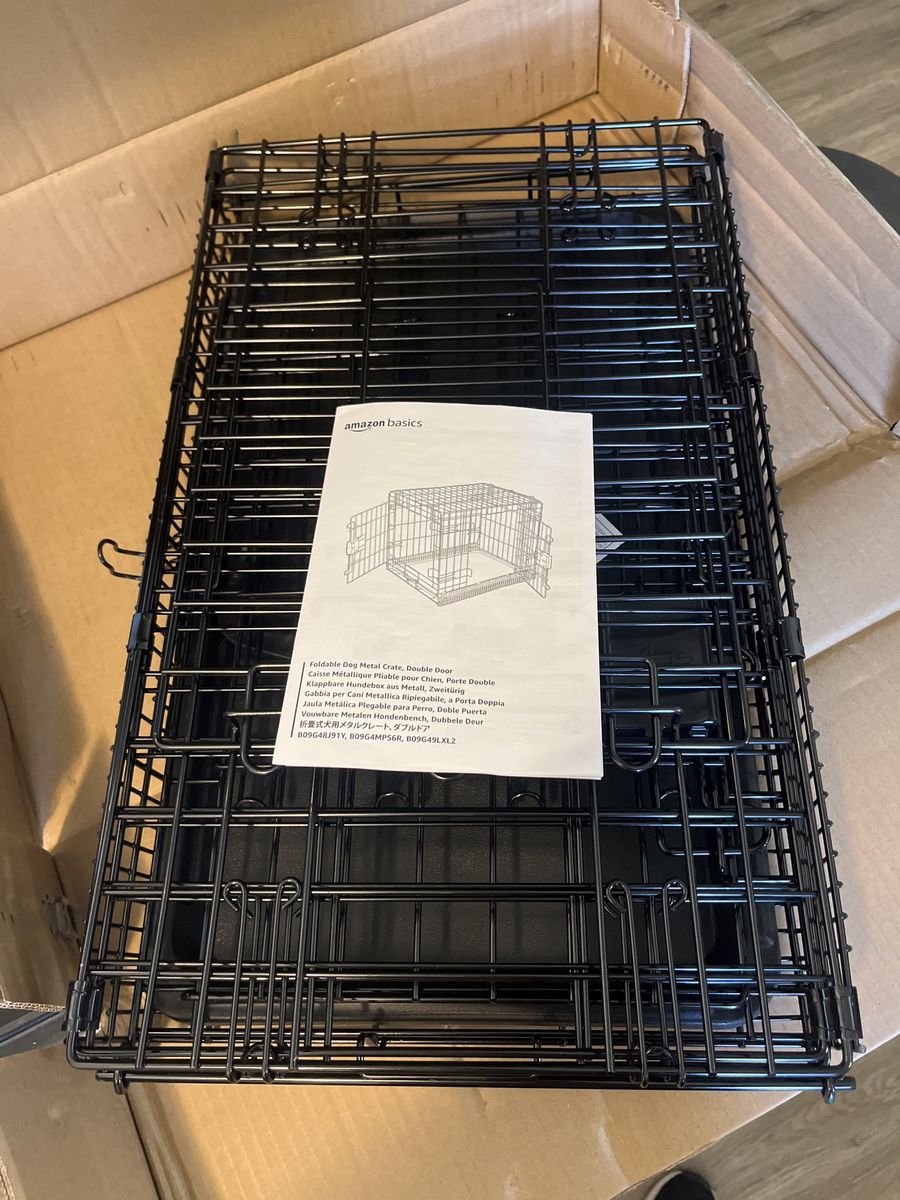 Amazon Basics Foldable Dog Metal Crate, Double Door, Black