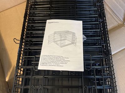 Amazon Basics Foldable Dog Metal Crate, Double Door, Black