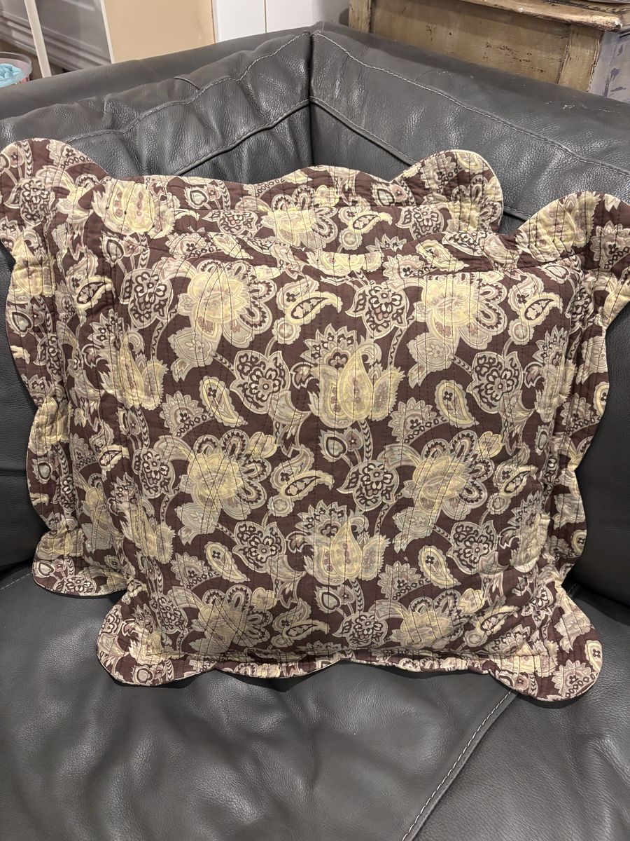 Pair of throw pillows, they are a dark purple.