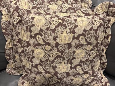 Pair of throw pillows, they are a dark purple.