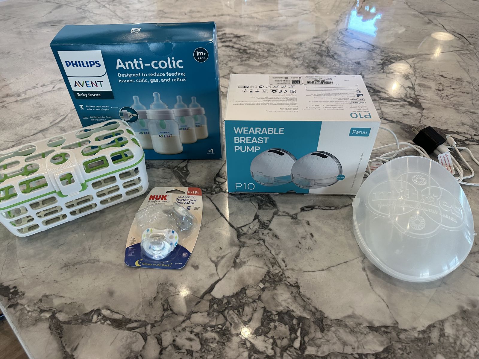 Wearable breast pump and accessories