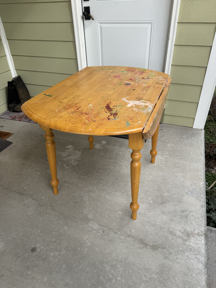 Wood table with three chairs