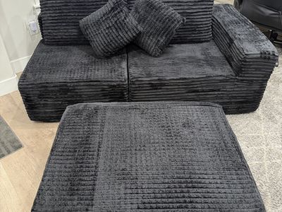 Boneless Black corduroy couch with ottoman