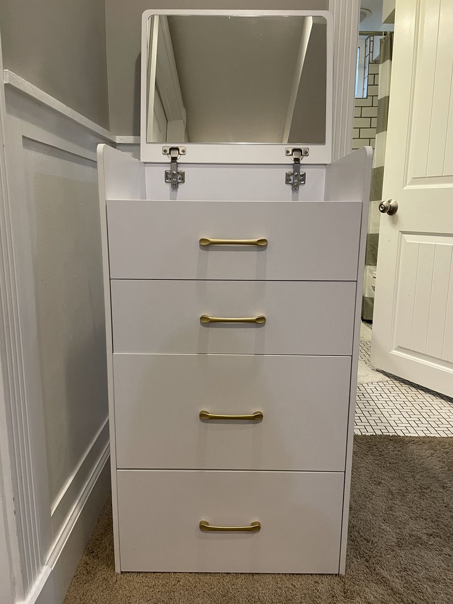 Vanity with built in mirror, stool, and drawers