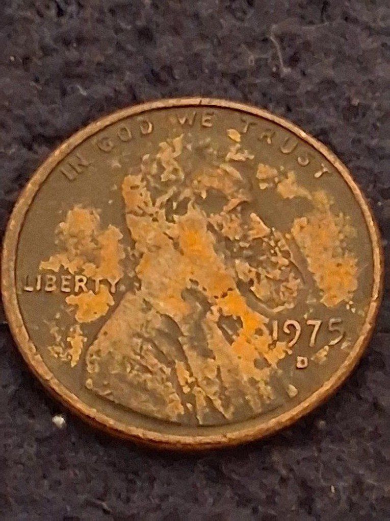 1975 D penny with die clash error on the mouth $10
