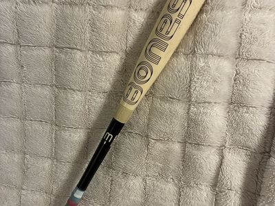 Warstick Bonesbr Baseball bat with pink and blue grip
