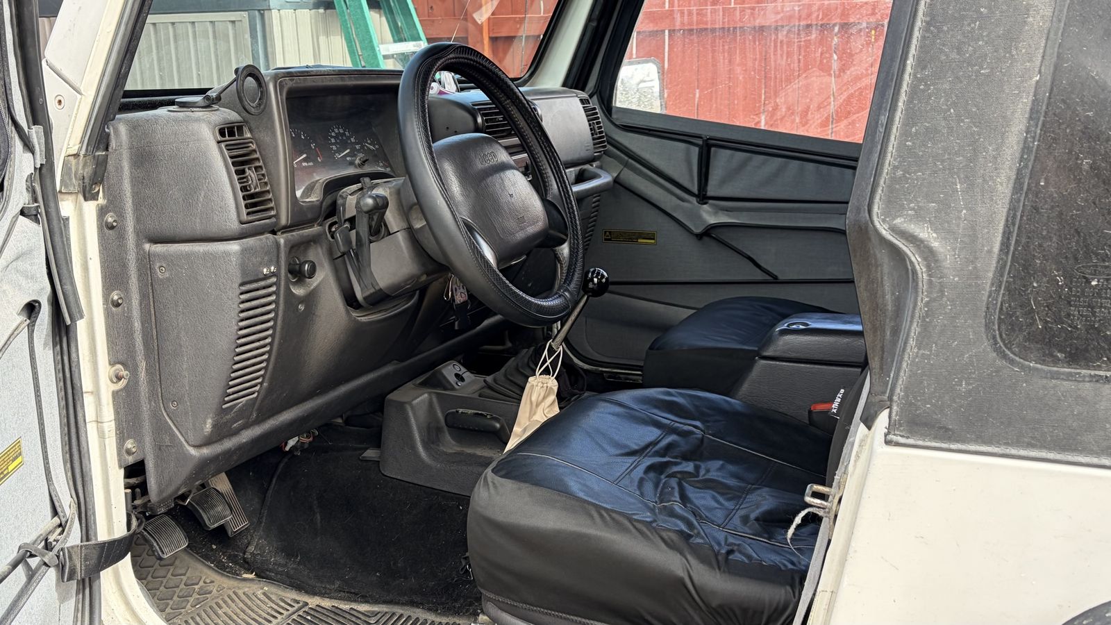 White Jeep Wrangler 4.0L with Soft Top and Custom Black Grill ...