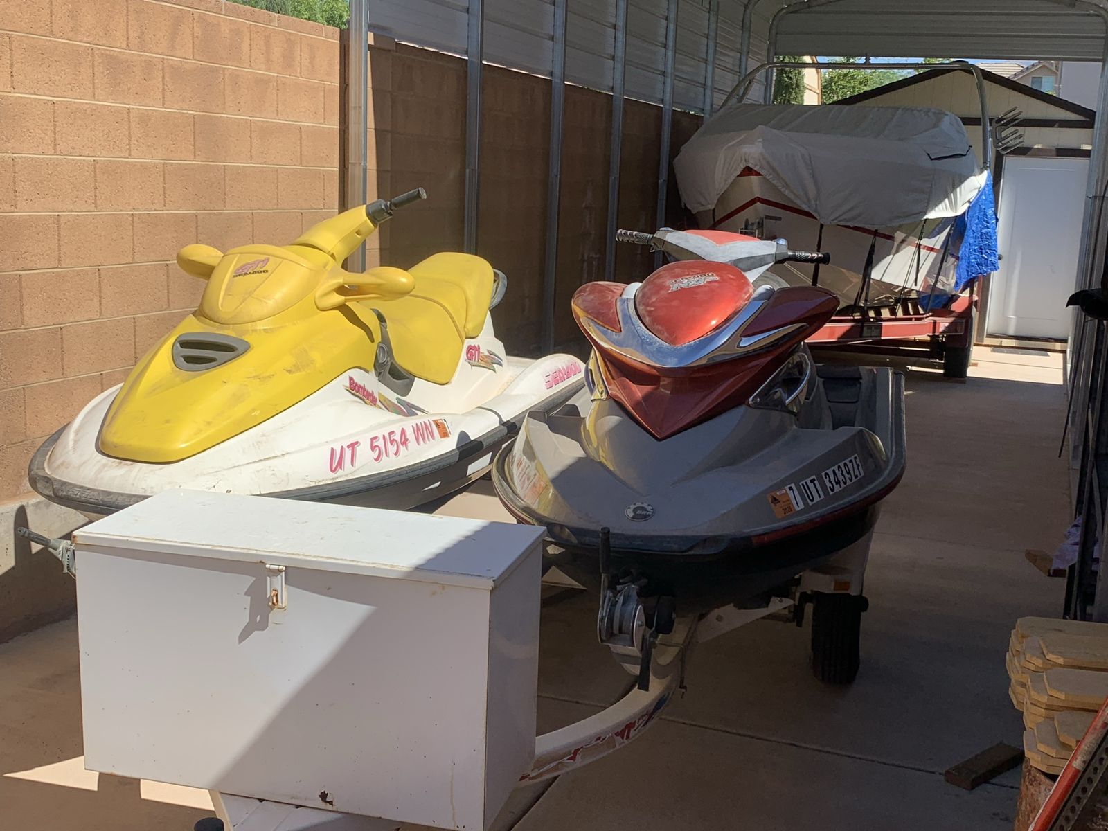 Pair of Sea-Doo Personal Watercraft (Yellow & Red/Gray) - Perfect for Summer Fun!