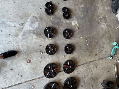 Rubber Coated Iron Olympic plate set (205 lbs)