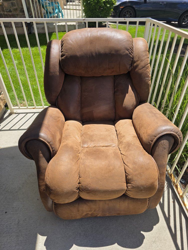 Brown leather rocking recliner