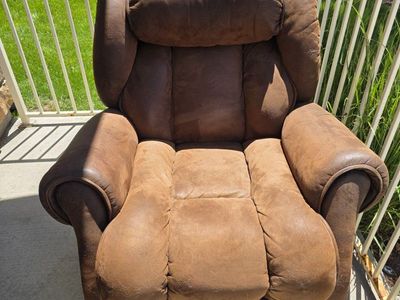 Brown leather rocking recliner
