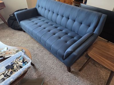 midcentury tufted blue couch