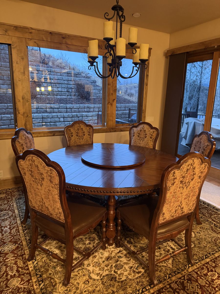 Dining room table and six chairs.