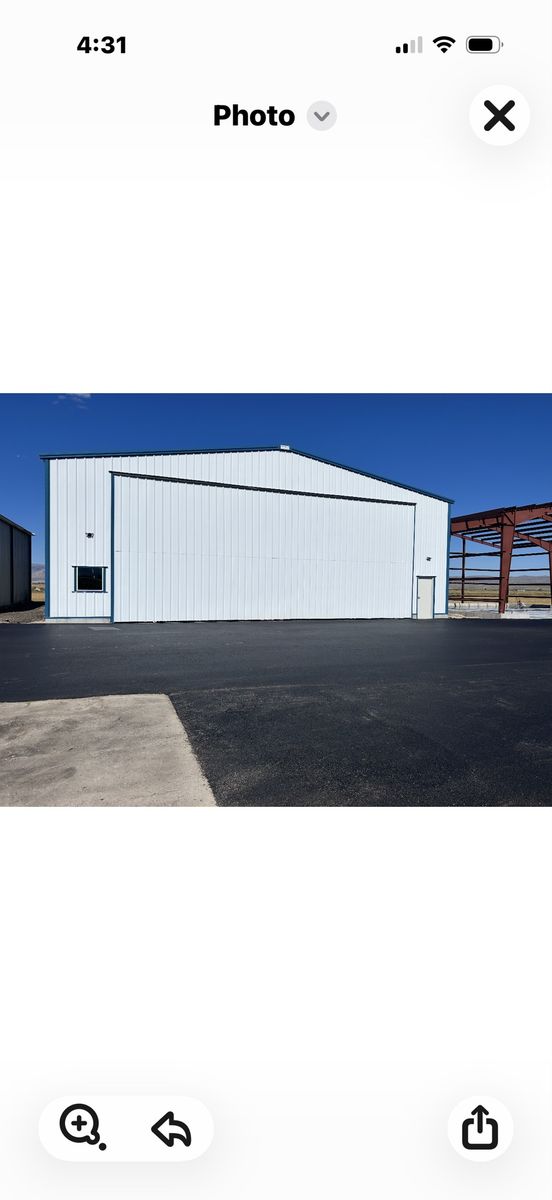 60 Wide x 50 Deep Airplane Hangar Building - Large Steel Structure with Bifold Door
