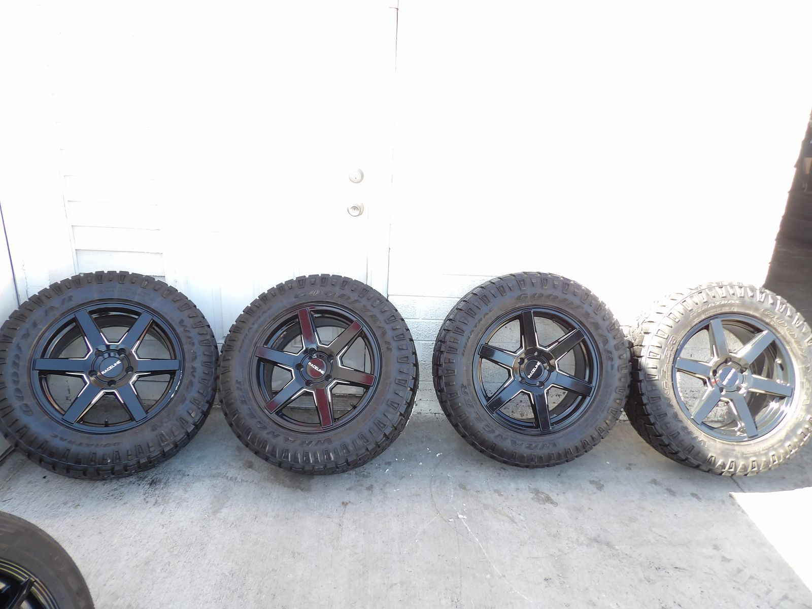 SET OF USED RACELINE WHEELS & TIRES 18X8.0 5X127 AND TIRES 265/60R18 GOODYERA WRANGLER DURATRAC