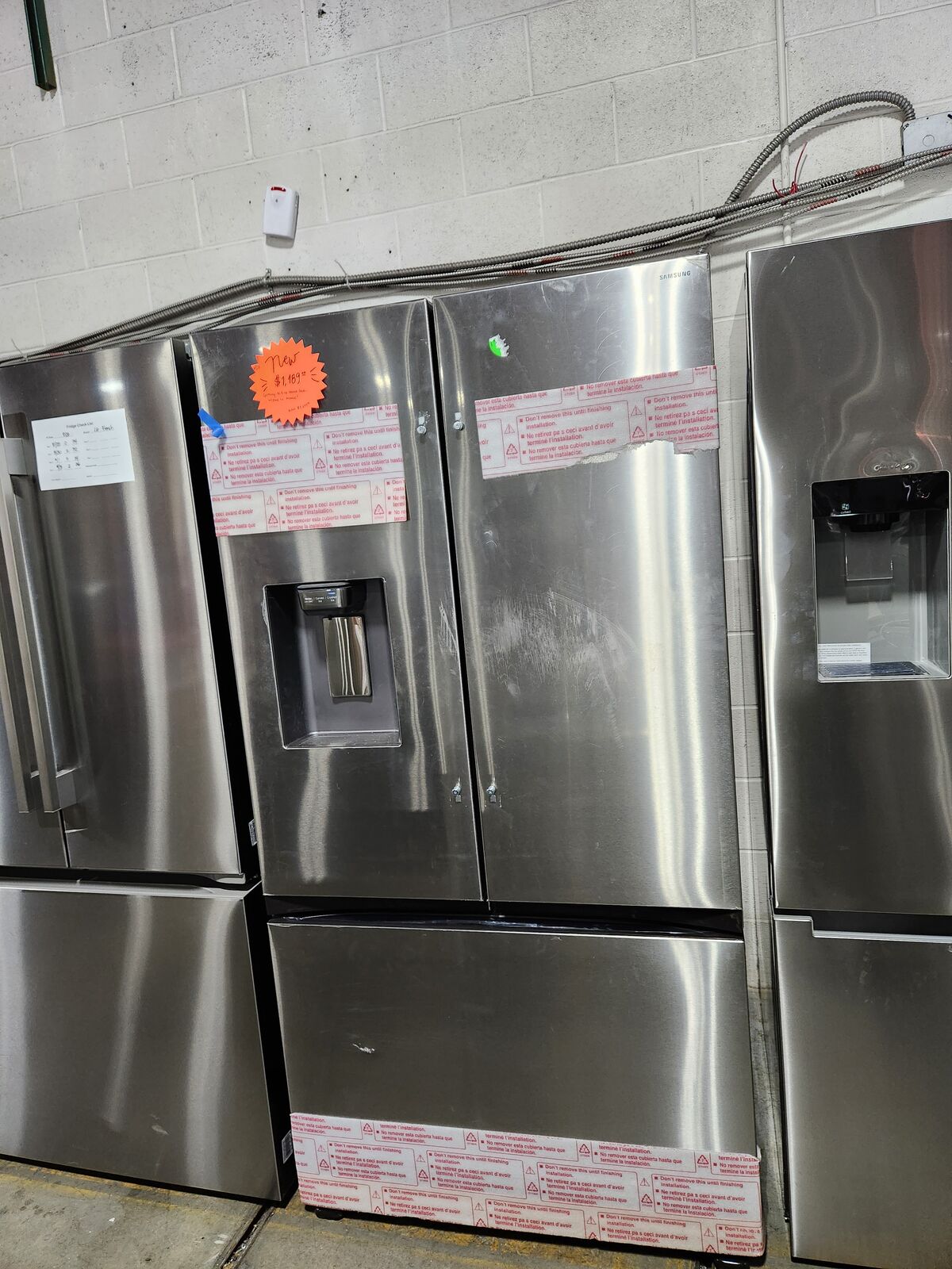BRAND NEW! SAMSUNG STAINLESS STEEL FRENCHDOOR FRIDGE!