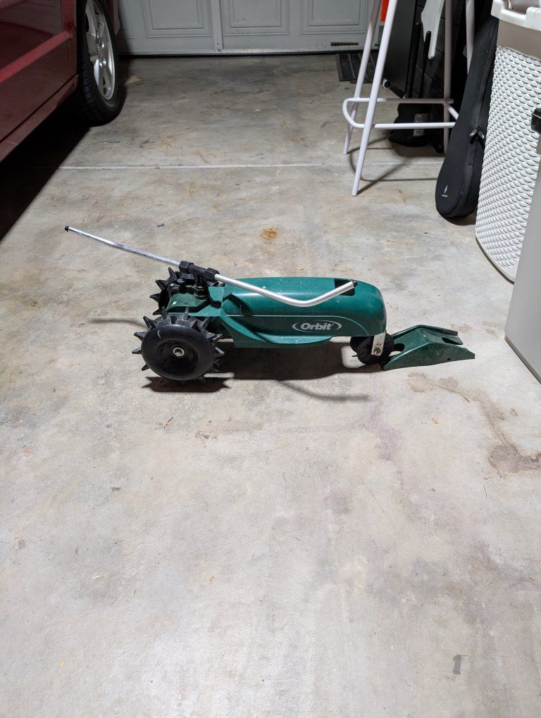 Orbit Traveling Tractor Lawn Sprinkler