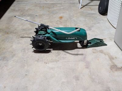 Orbit Traveling Tractor Lawn Sprinkler