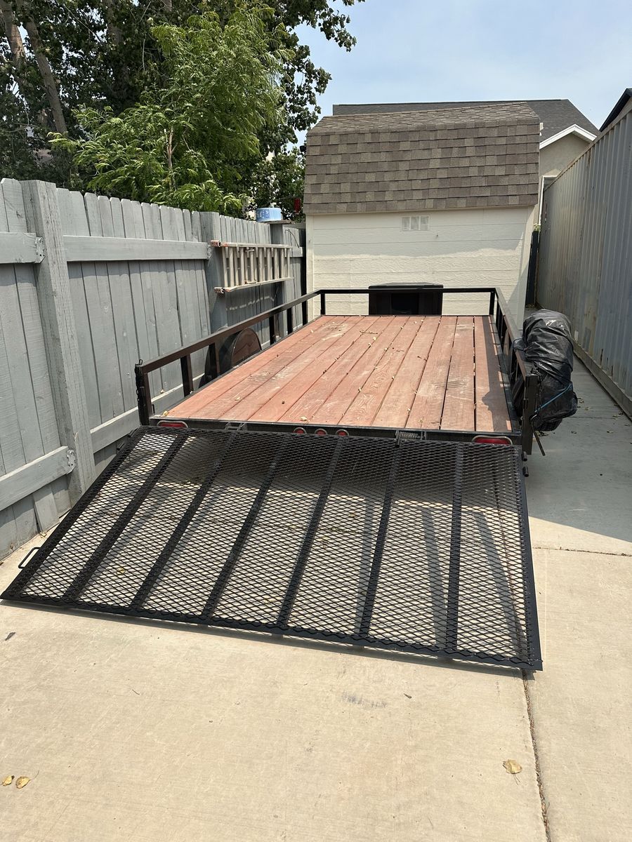Utility Trailer with Drop-Down Ramp - Excellent Condition, Ready to Haul!