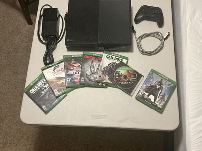 Xbox One Console with Controller, Power Supply, and 8 Games.