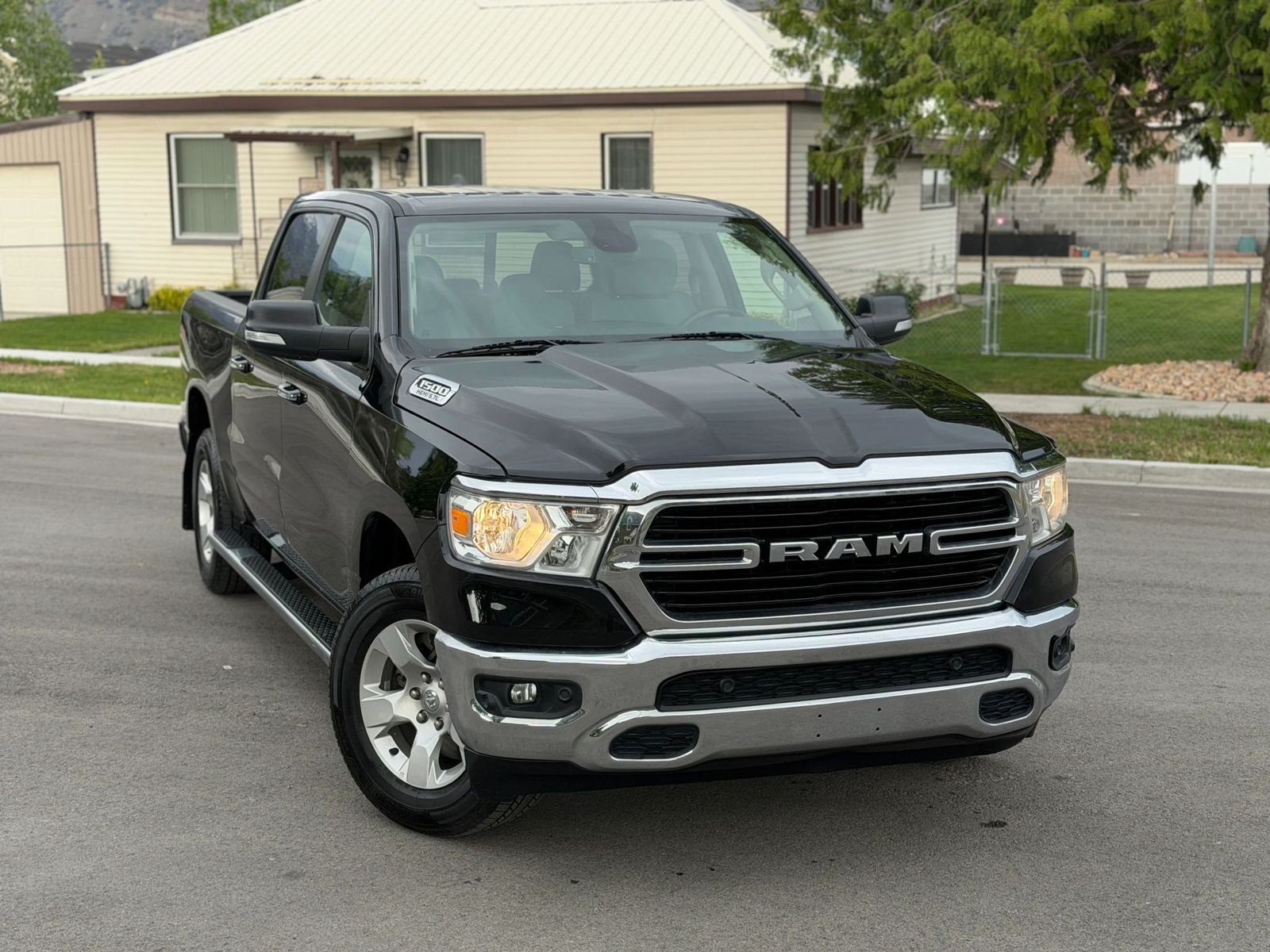 2020 RAM 1500 Big Horn — rebuilt & branded title, 9% below market