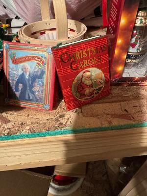 A Christmas Carol” by Charles Dickens and generic “Christmas Carols” book