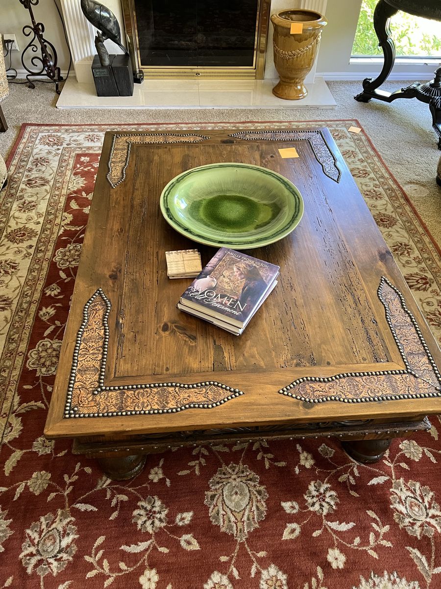 Rustic Wood Coffee Table with Decorative Embossed Metal Accents