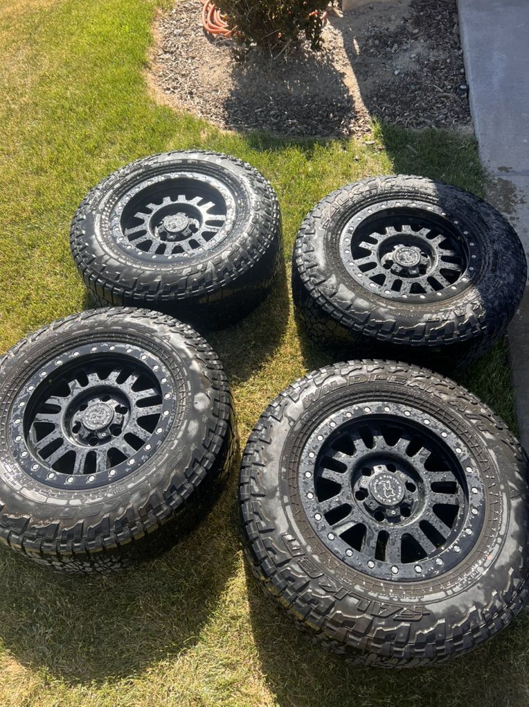 Black Rhino Wheels And Falken Wildpeak Tired