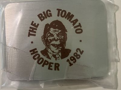 Belt buckle with President Reagan’s picture.