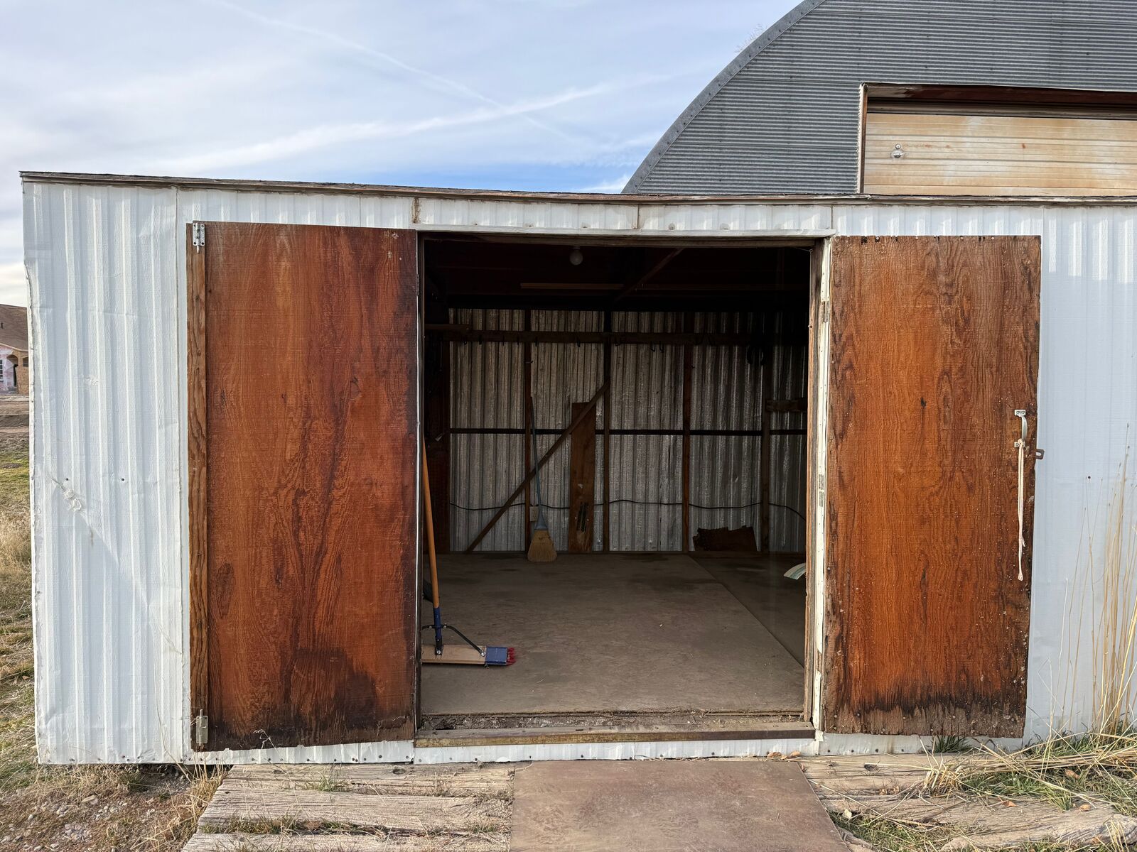 White Wood Frame and Aluminum Tool Shed