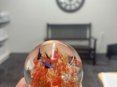 Art Glass Paperweight with Orange and Gold Inclusions & Blue Fish Accent