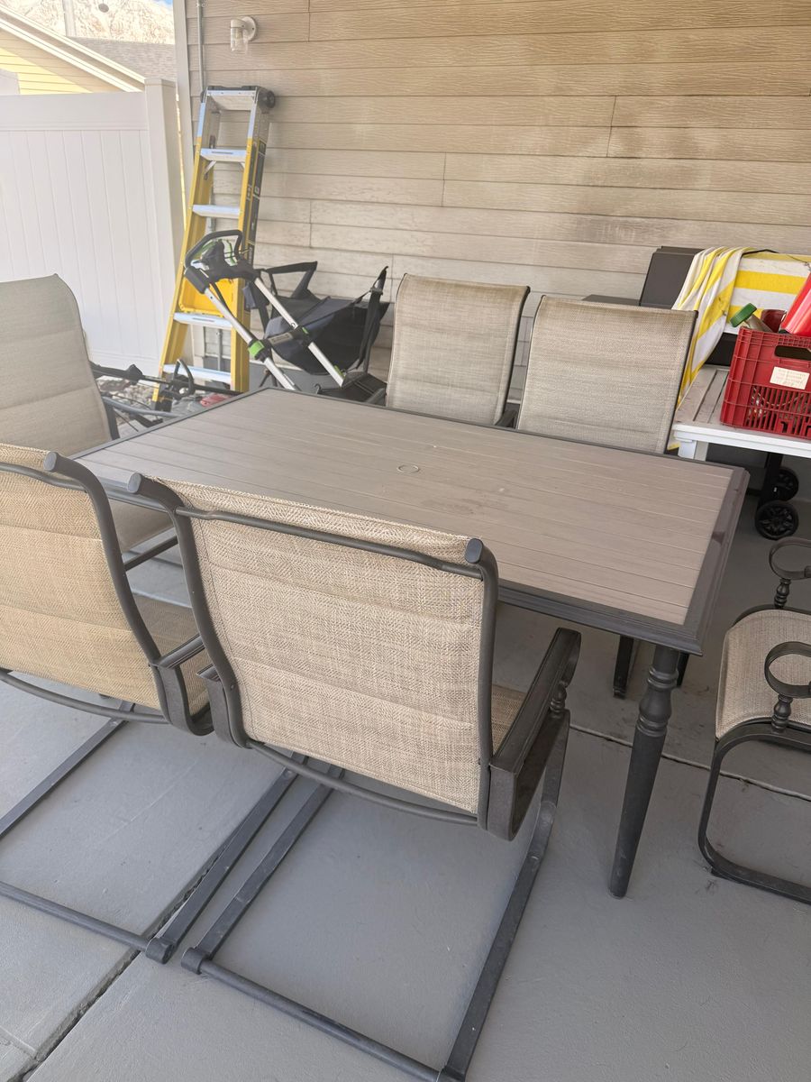 Outdoor Wood table and fiber chairs