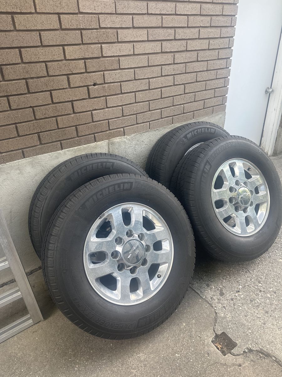 Michelin Defender LTX M/S LT265/70R18 Tires on Chevy 8-Lug Wheels (Set of 4)