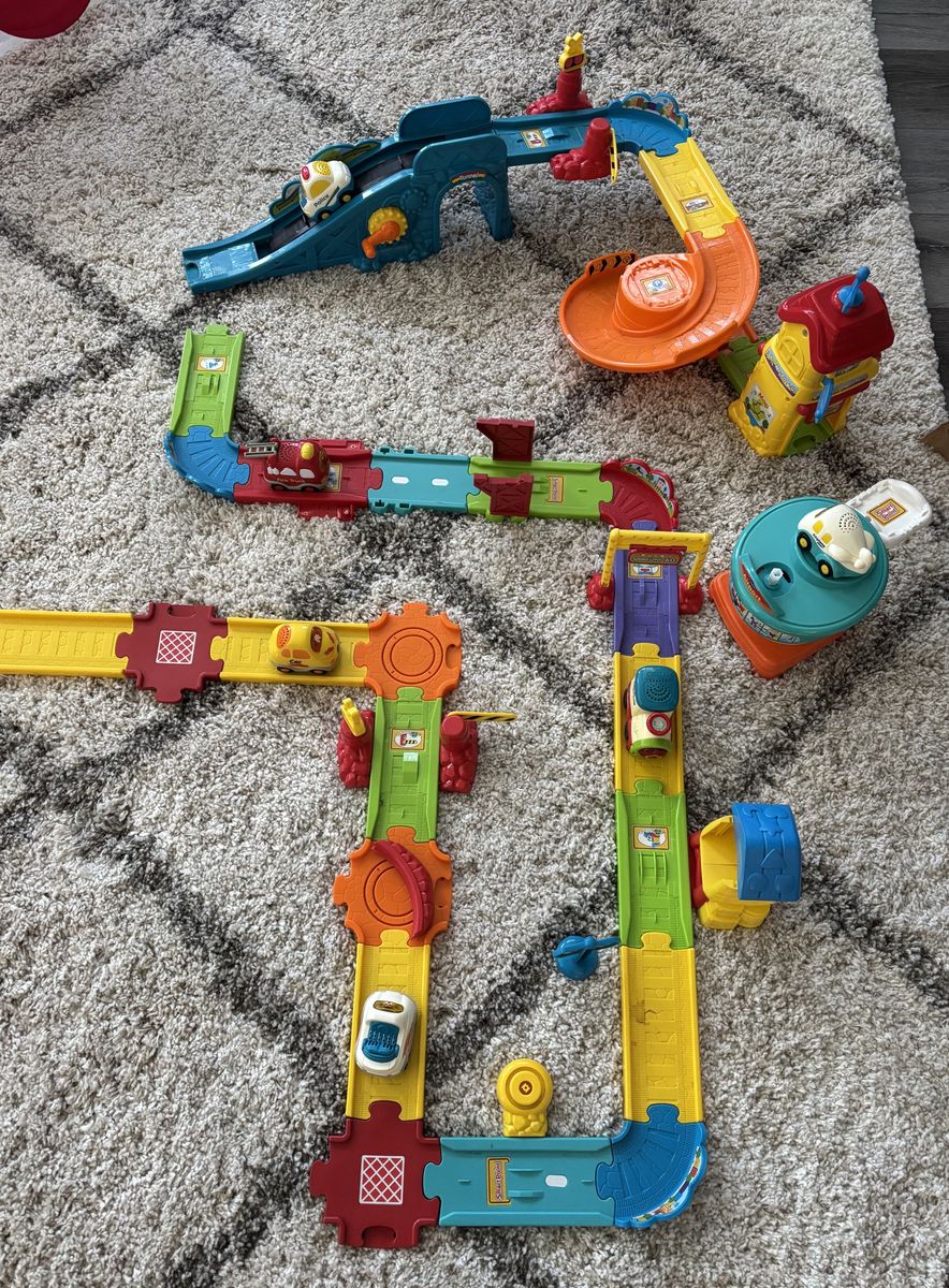 Vtech car/train/airplane play set.