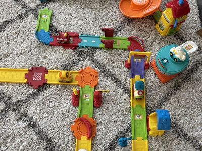 Vtech car/train/airplane play set.