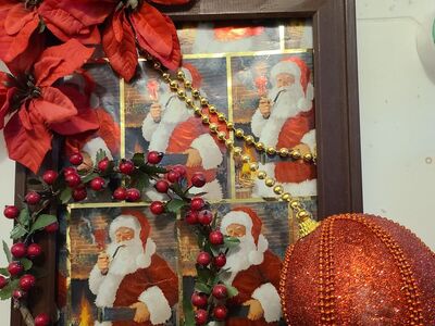 #7 Santa with Poinsettia Decoration 12x10