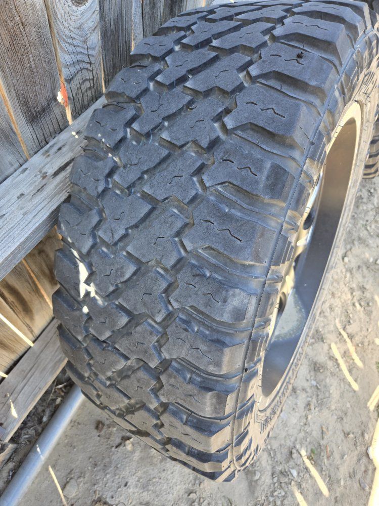 Fury Country Hunter M/T 35x12.50R22LT Tires with 22-inch Black & Machined Wheels