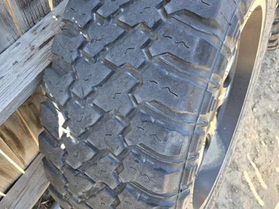 Fury Country Hunter M/T 35x12.50R22LT Tires with 22-inch Black & Machined Wheels
