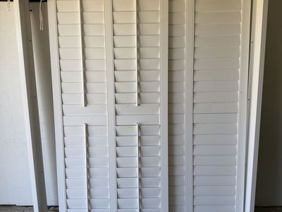 2-Door Bypass plantation blinds (two shutter panels slide past each other on a double track).