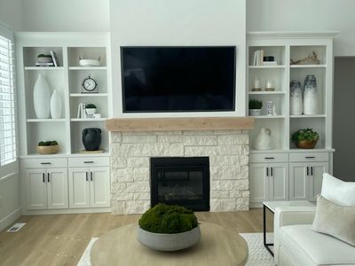 CUSTOM FIREPLACE SURROUNDS, ENT. CENTERS, BOOKCASES, DESKS, CABINETRY