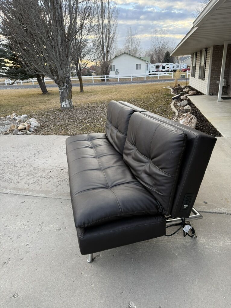 Black Futon With Power Connections