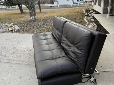 Black Futon With Power Connections