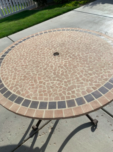 Unbreakable Stone Patio Table with Red Crank Umbrella