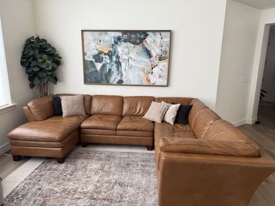 Brown Leather U-Shaped Sectional Sofa with Left-Facing Chaise