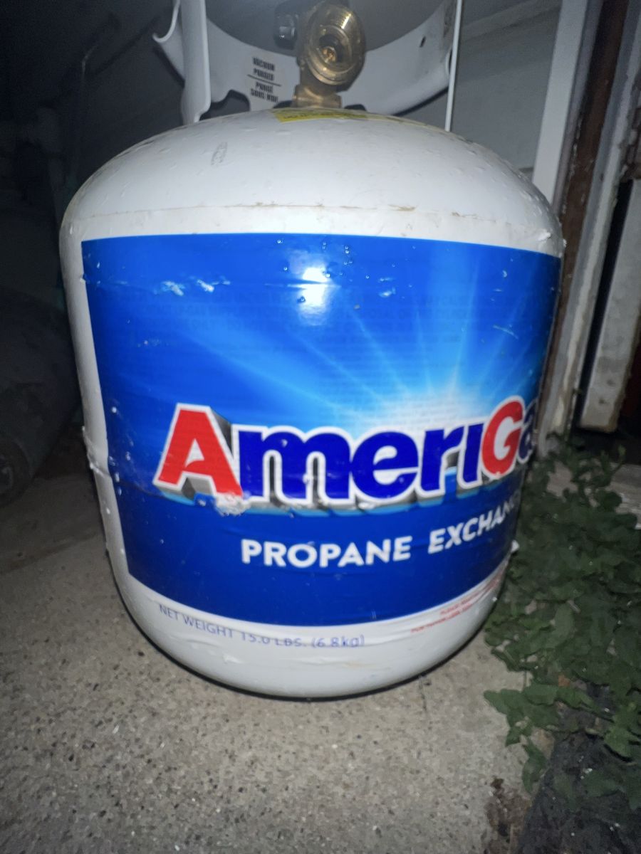 Empty 20lb propane tank, ready for refill or exchange.