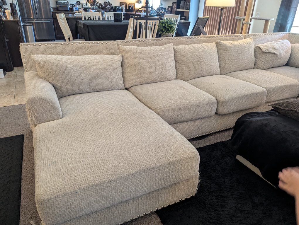 Large Beige Sectional Couch with Nailhead Trim and Chaise Lounge - Fabric Upholstery