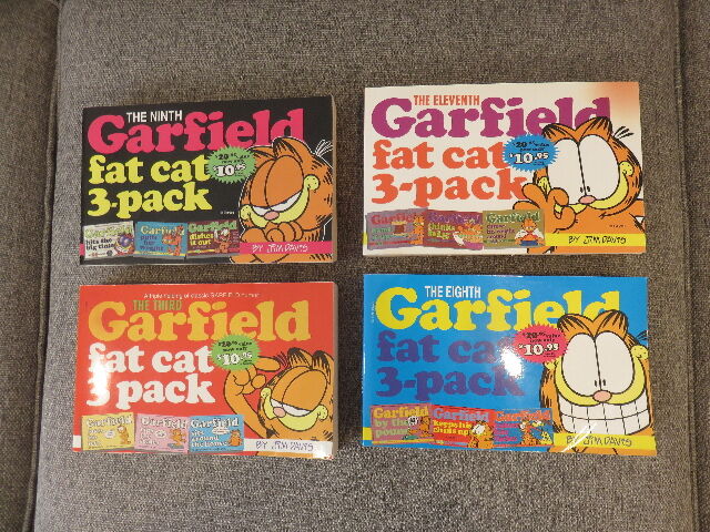 FOUR GARFIELD FIRST EDITION "FAT CAT 3-PACKS" FROM THE MID-1990'S - SELLING AS A SINGLE LOT