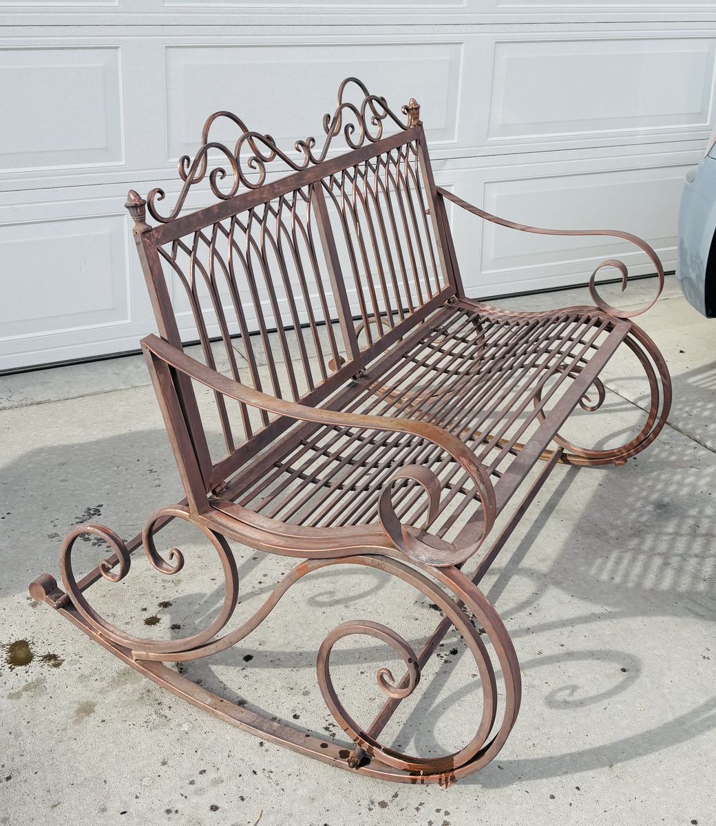 Rocking outdoor metal bench